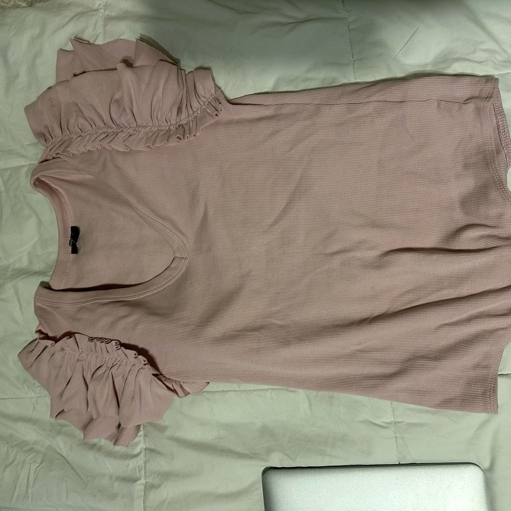 light pink bodysuit with ruffled sleeves
